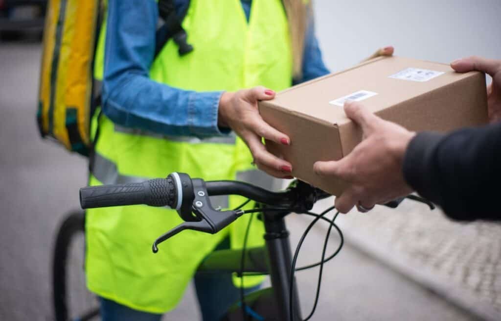 Delivery rider using a bicycle to deliver